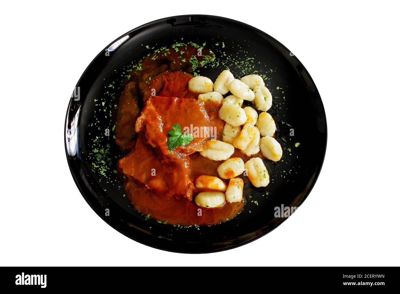 Pasticada con gnocchi, stufato di manzo in salsa. Cucina croata Foto Stock