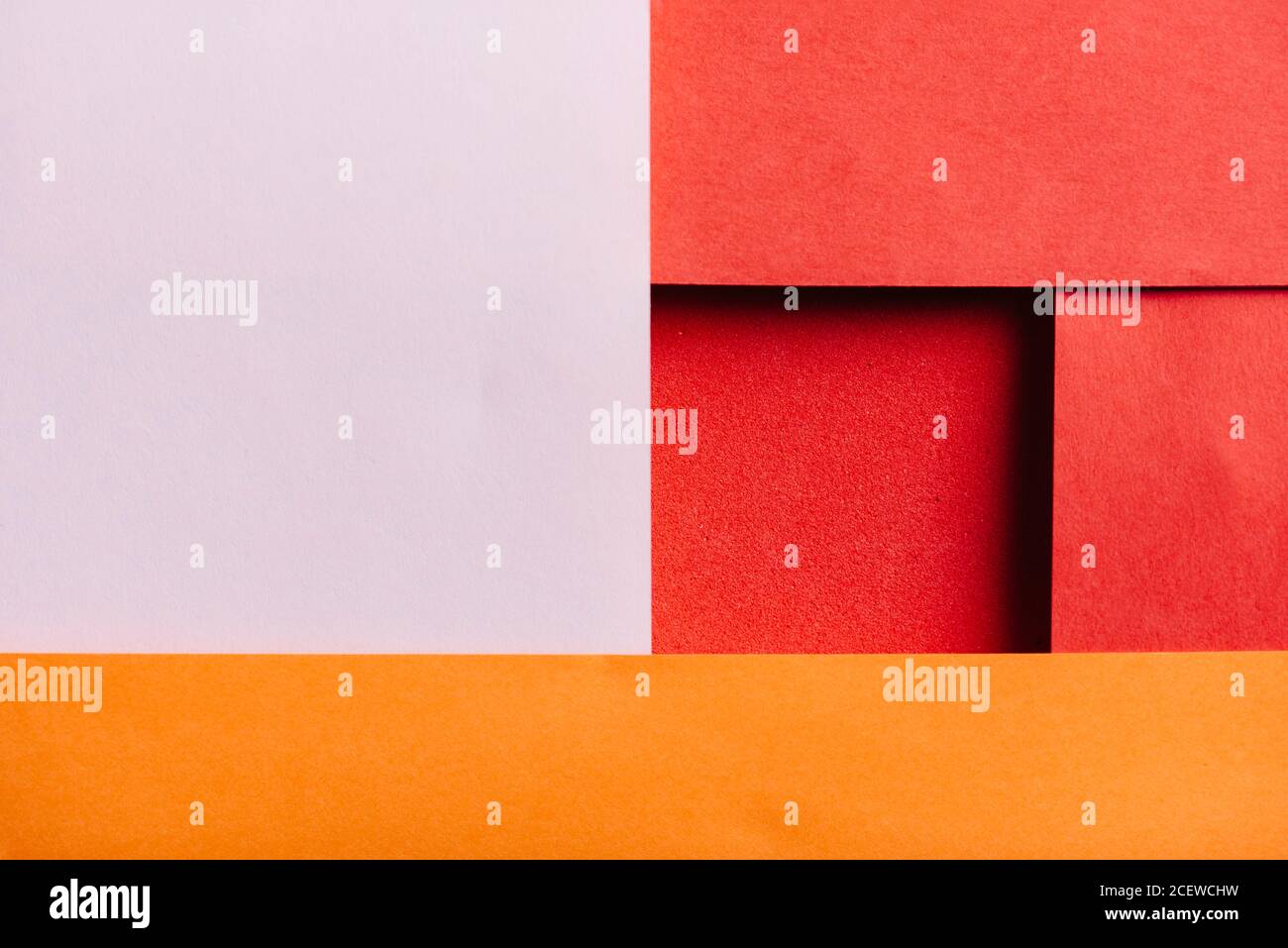 Geometria astratta colore carta trama sfondo con luce e ombra. Banner con layout di design moderno di Origami 3D minimal. Vivace e creativo quadrato colorato Foto Stock