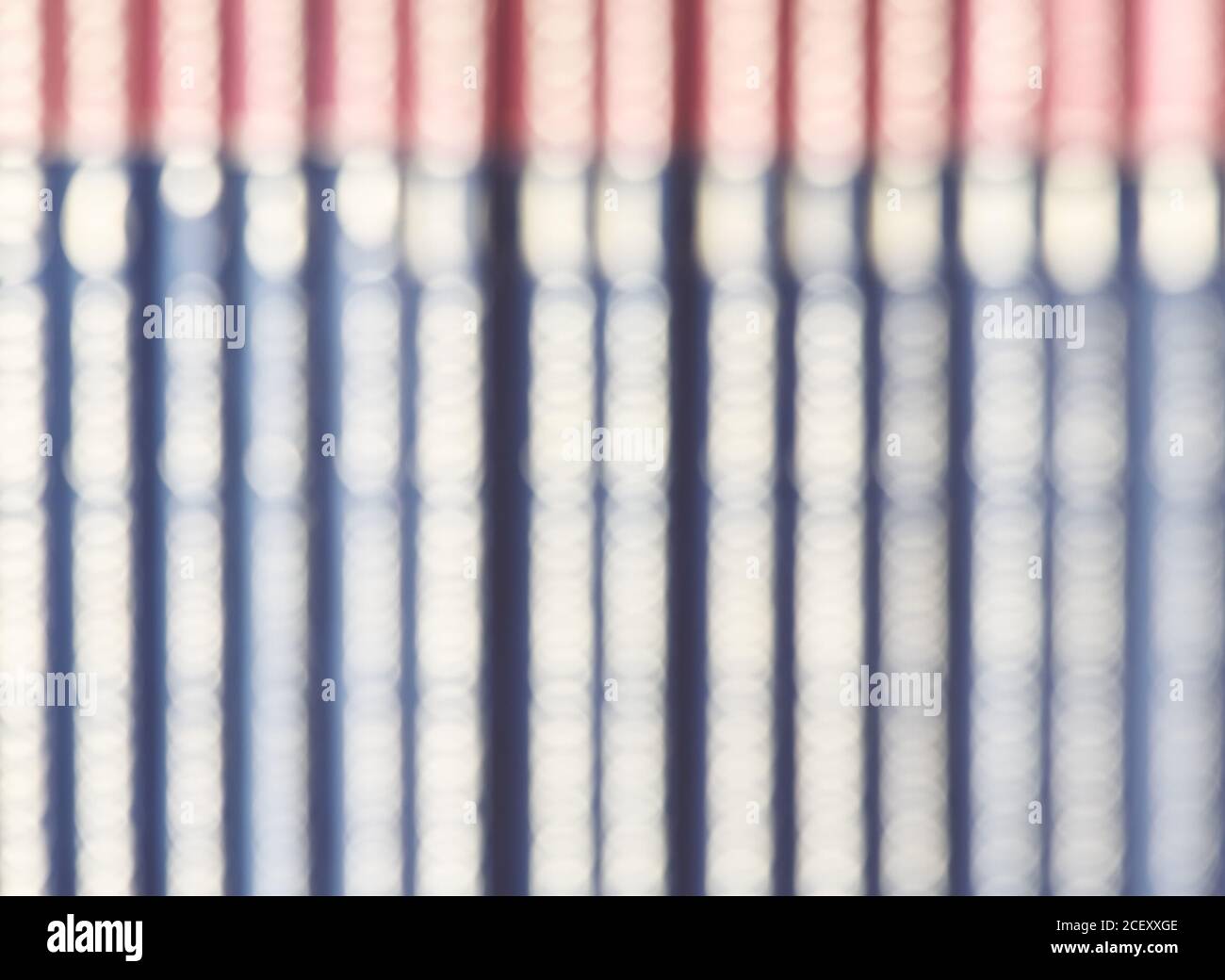 Sfondo astratto fatto di sfuocate spine libro. Foto Stock