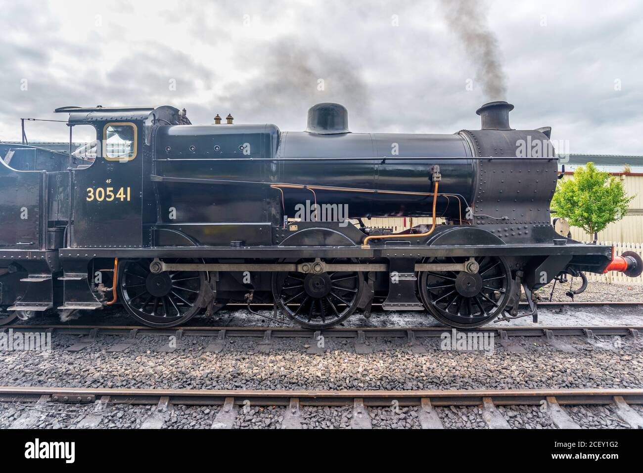 The Rocket, locomotiva a vapore nero sulla linea ferroviaria Bluebell Heritage, Horsted Keynes, West Sussex, Inghilterra, Regno Unito Foto Stock