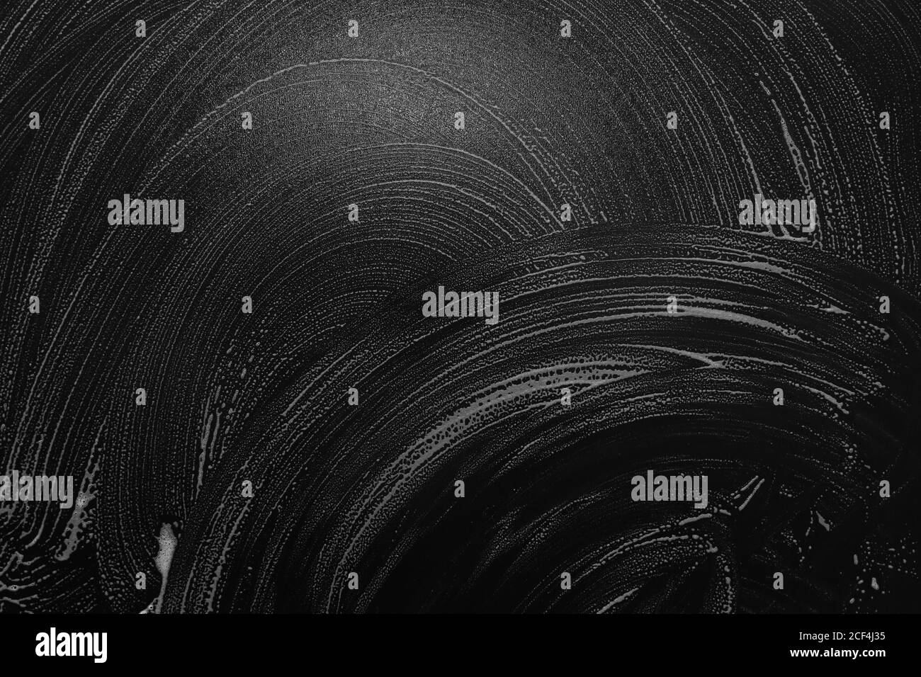 Astratto sfondo nero con schiuma bianca buona per testo cafe,bar e lavanderia Foto Stock