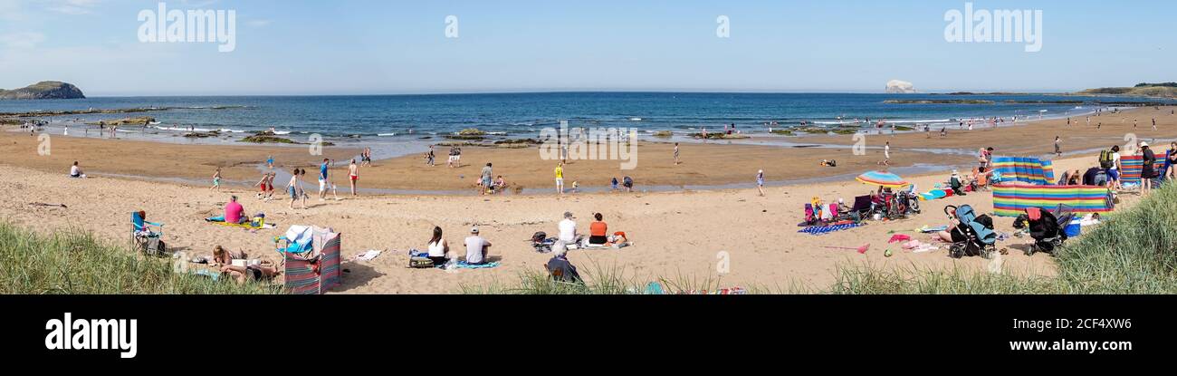 Turisti a East Beach, Milsey Bay, North Berwick Foto Stock