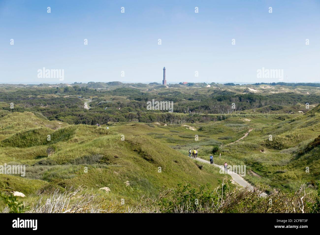 Dune panoramiche nel mezzo dell'isola, faro, Norderney, Isole Frisone Orientali Foto Stock