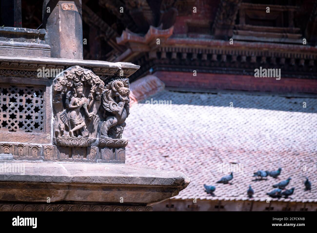 La statua di dio scolpita all'interno del Krishna Mandir (Tempio di Krishna) in Piazza Patan Durbar, Patan, Nepal Foto Stock