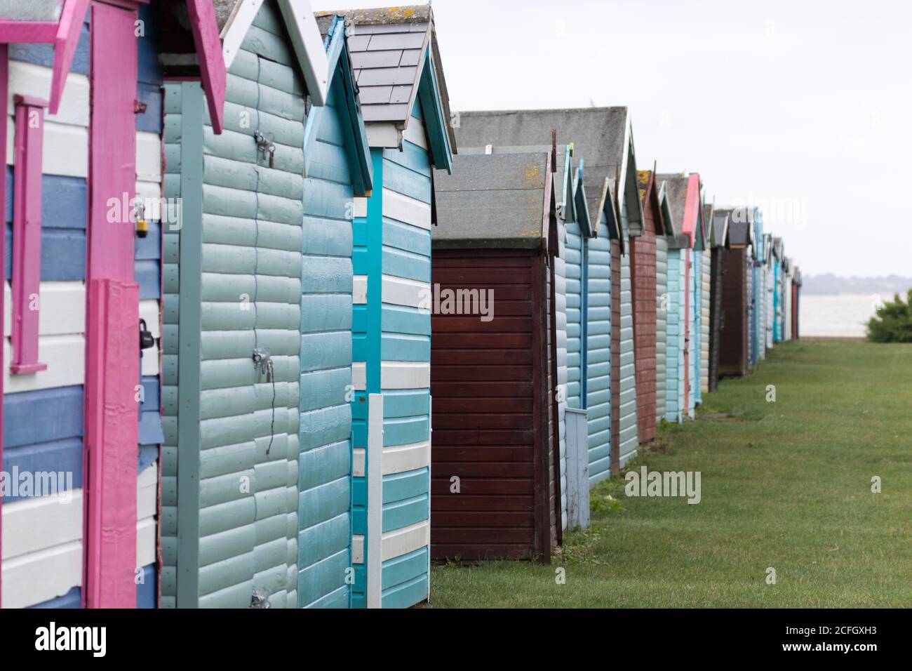Colorate capanne sulla spiaggia a Harwich, Essex, Regno Unito Foto Stock