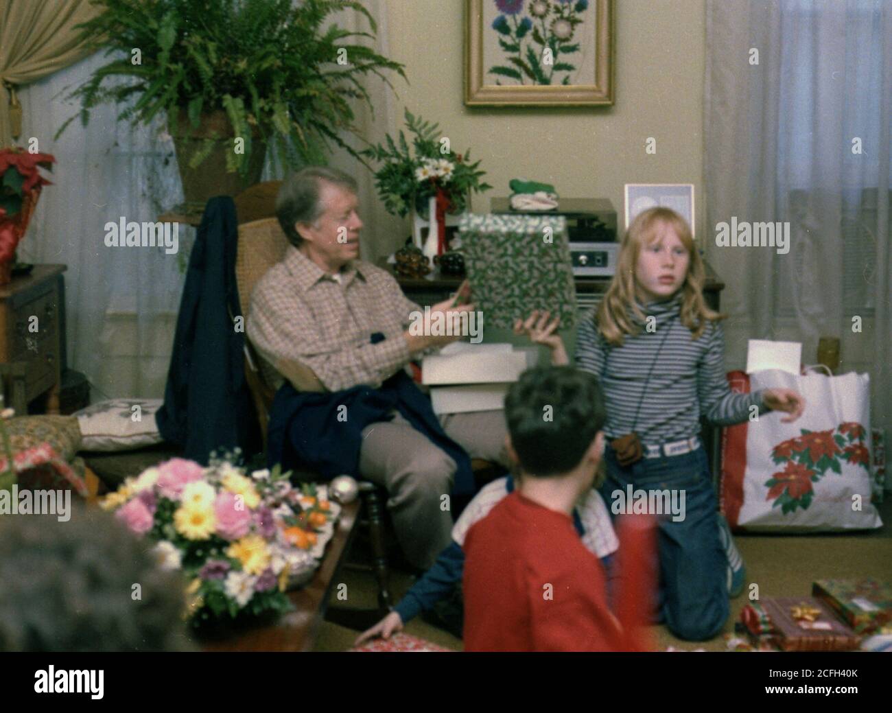 Jimmy carter e la famiglia festeggiano il Natale a casa ca. 12/25/1978 Foto Stock