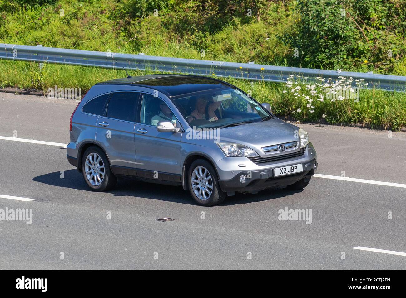 2007 argento Honda Cr-V EX i-CTDI; veicoli veicolari, veicoli che guidano su strade del Regno Unito, motori, motori sulla rete autostradale M6. Foto Stock