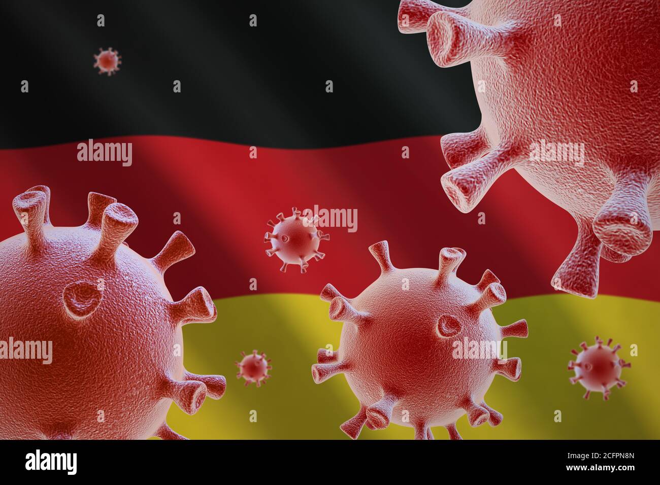 COVID-19. Cellule di coronavirus sullo sfondo della bandiera della Germania Foto Stock