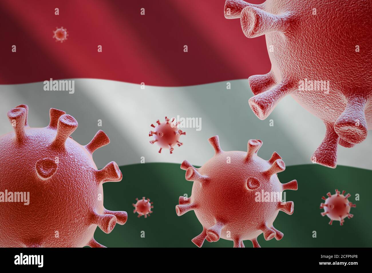 COVID-19. Cellule di coronavirus sullo sfondo della bandiera dell'Ungheria Foto Stock
