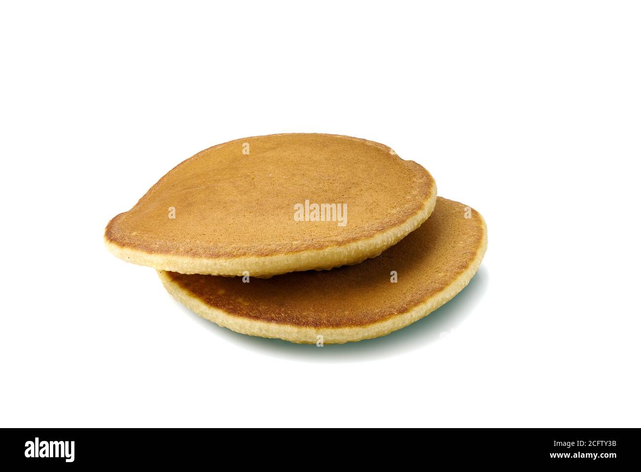 Due pancake su sfondo bianco Foto Stock