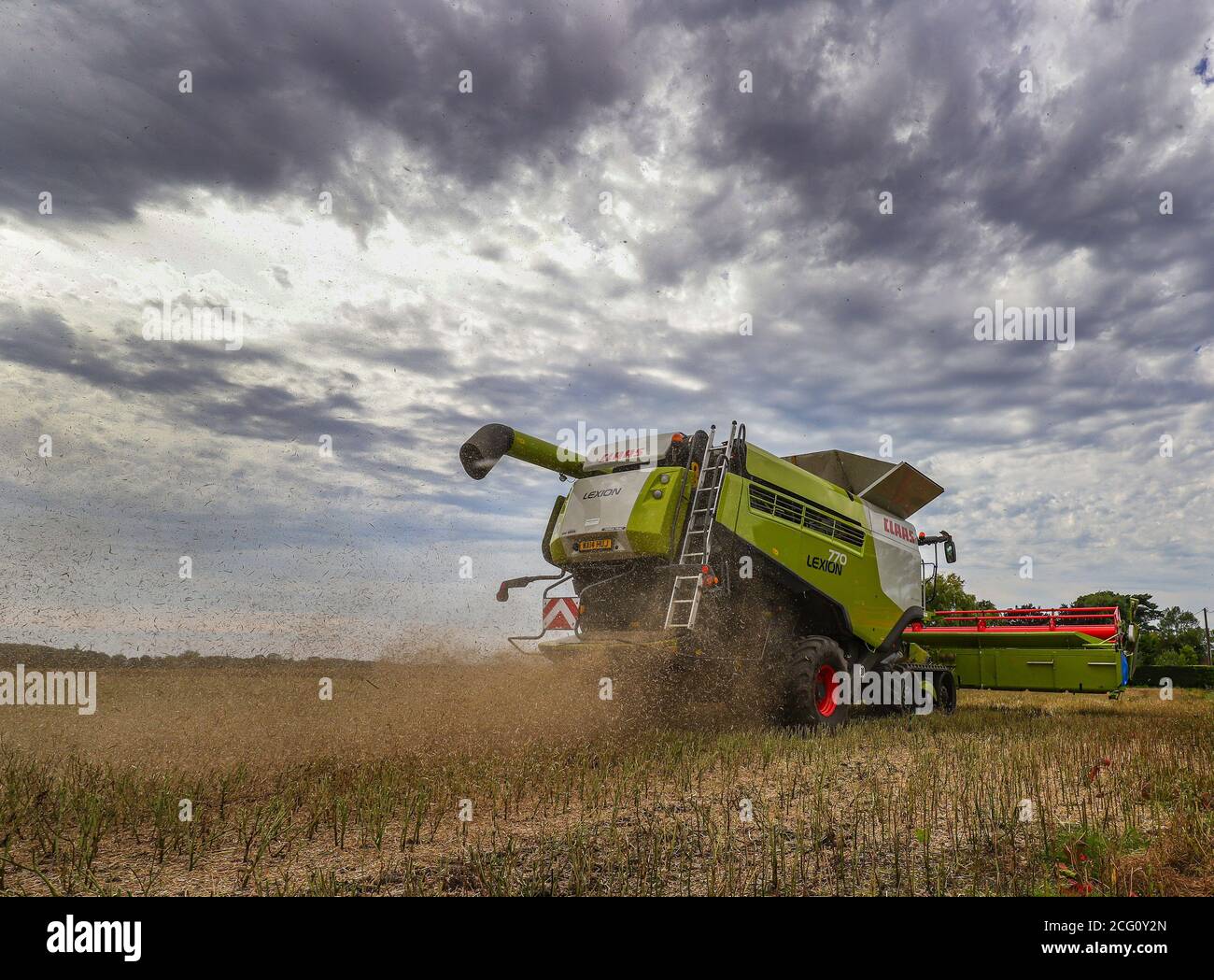 Un tempo occupato per gli agricoltori reso più facile da questo fantastico macchina Foto Stock