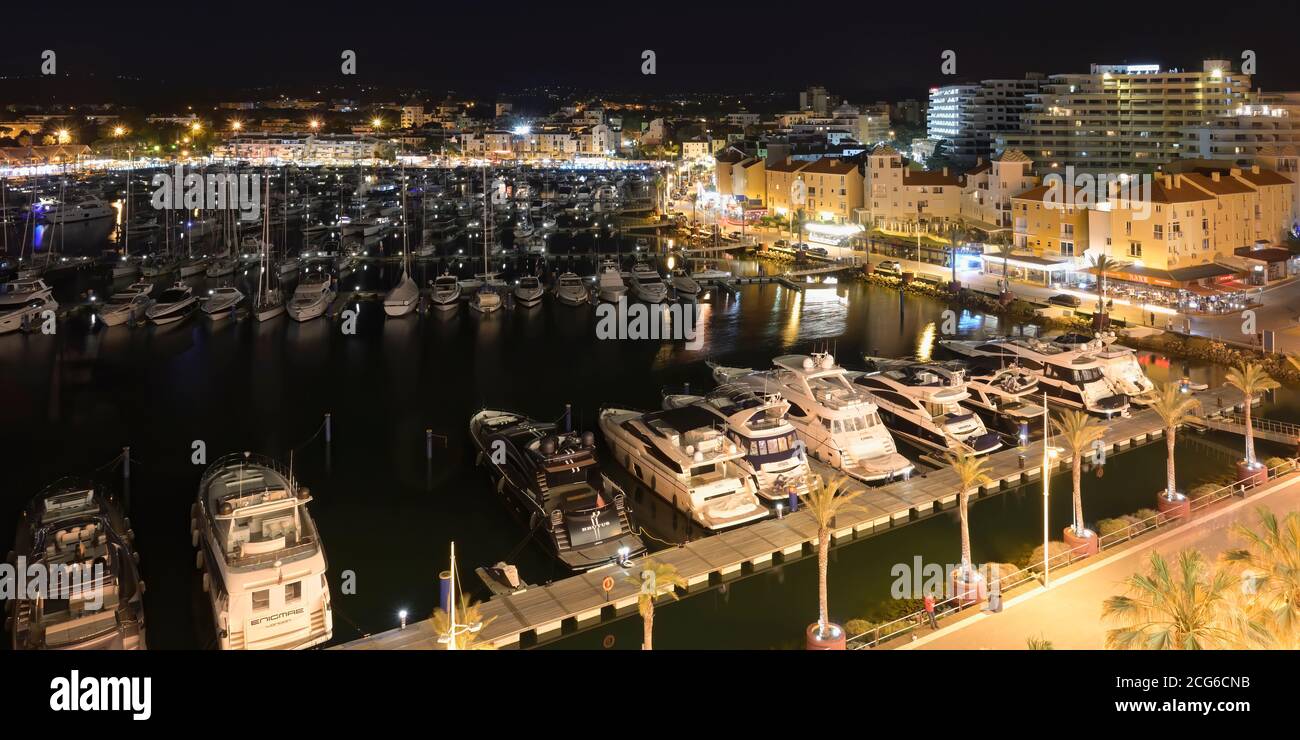 Porto turistico di Vilamoura di notte, Algarve, Portogallo, Foto Stock