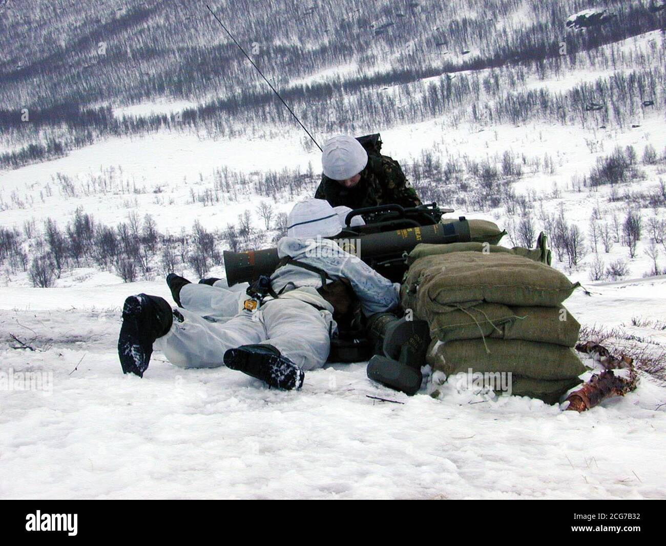 Royal Marines in pattuglia in Norvegia. I membri di 3 truppe artiche e di guerra di montagna del Commando Brigade potrebbero partecipare a qualsiasi operazione di follow-up in Afghanistan, una volta terminata l'attuale fase degli attacchi aerei. *... Ma il segretario alla Difesa Geoff Hoon ha accennato venerdì 12 ottobre 2001 che qualsiasi dispiegamento di truppe di terra all'interno dell'Afghanistan da parte dell'America e dei suoi alleati potrebbe dover attendere fino alla prossima primavera per avvertire delle difficoltà di campagna durante il duro inverno del paese, ora a due o tre settimane di distanza. Foto Stock