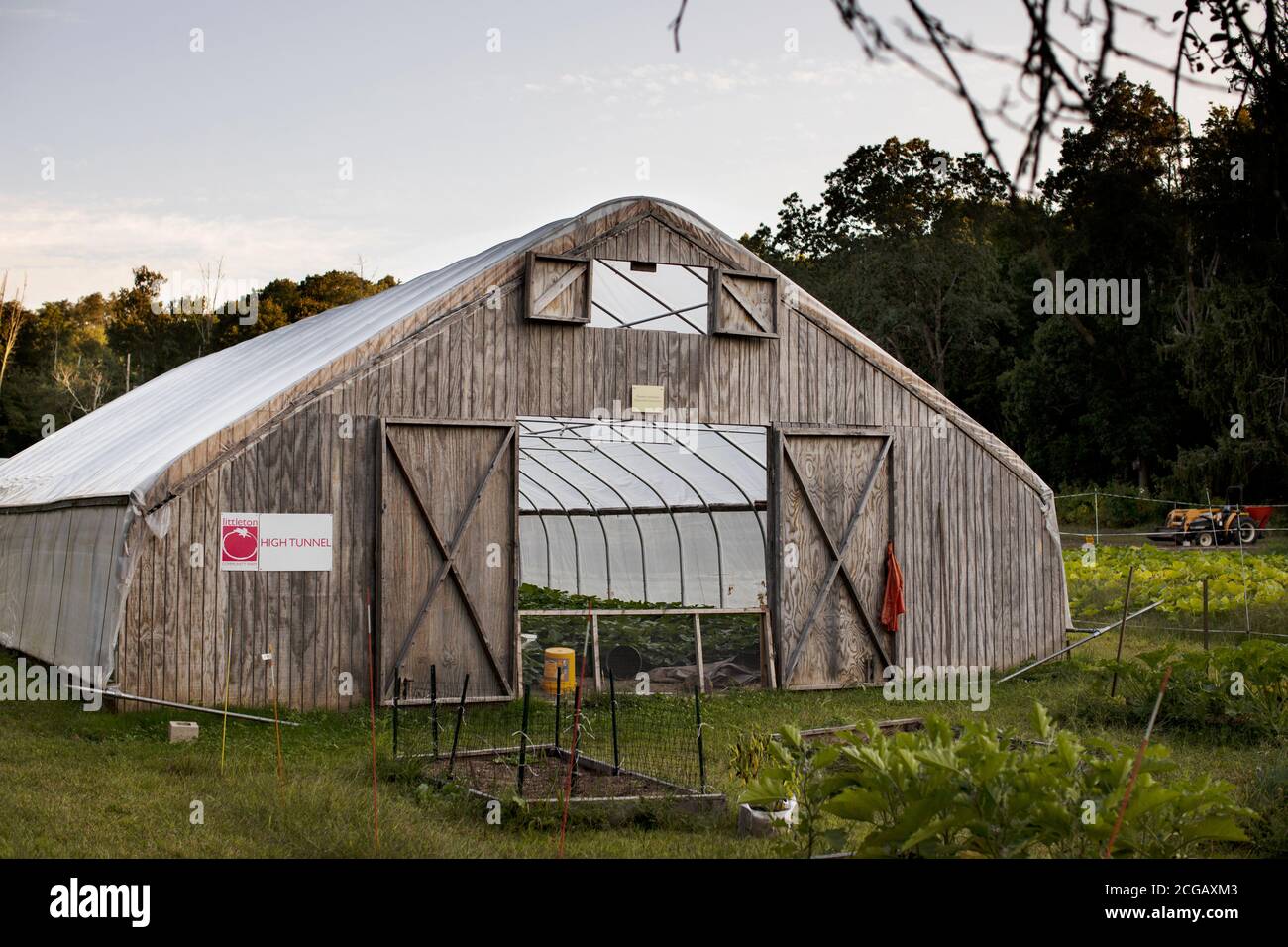 Un edificio a serra presso la Littleton Community Farm di Littleton, Massachusetts, USA. Foto Stock