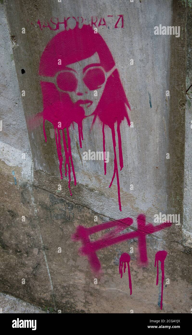 Hong Kong, Cina:25 Mar, 2020. Illustrazione su Pound Street Steps. Imashoparazzi stencil work on the concrete wall di Los Angeles artist RT. Alamy Stock Foto Stock