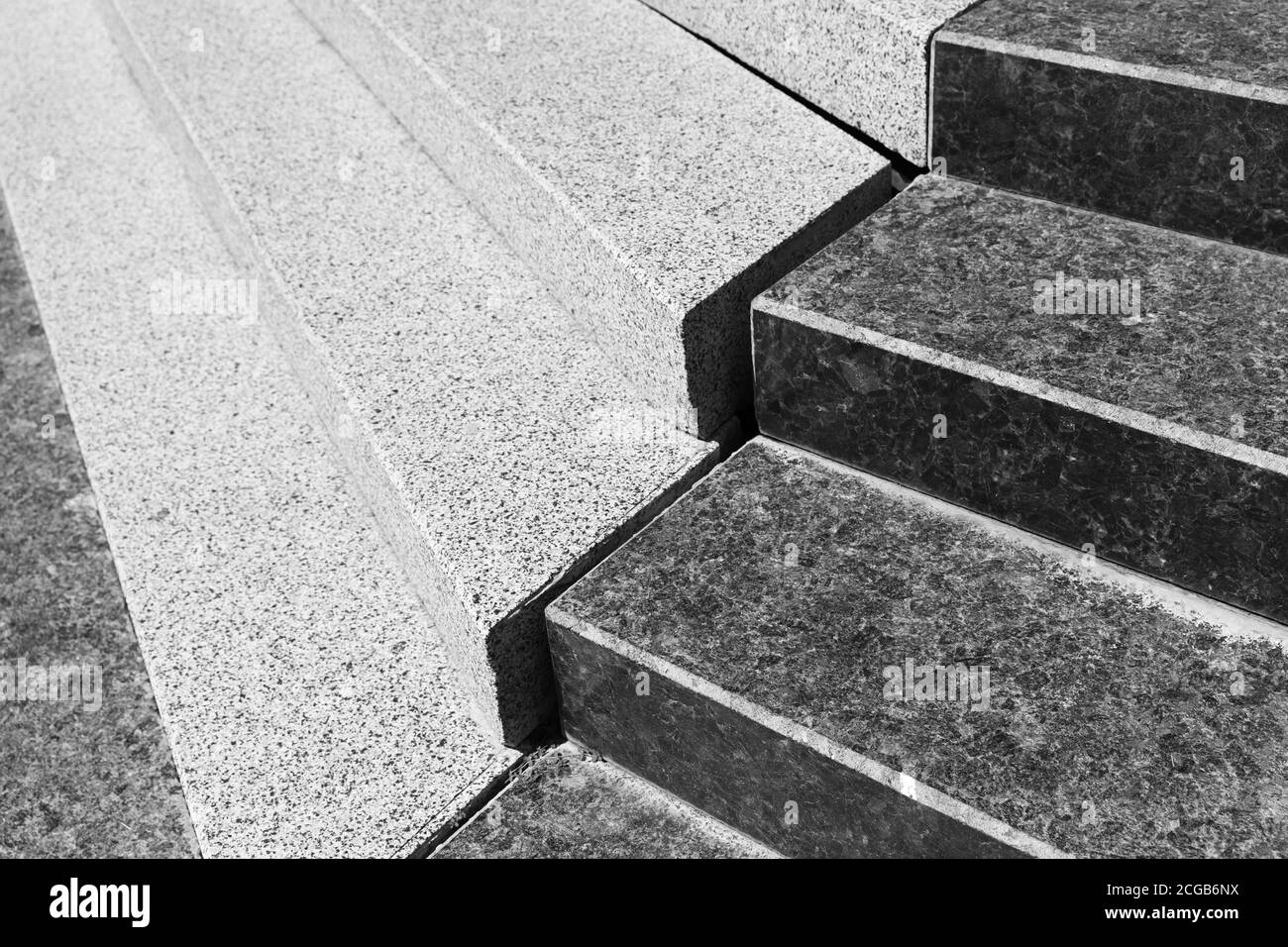 Astratto sfondo architettonico con una scala vuota in nero e pietra di granito bianco Foto Stock