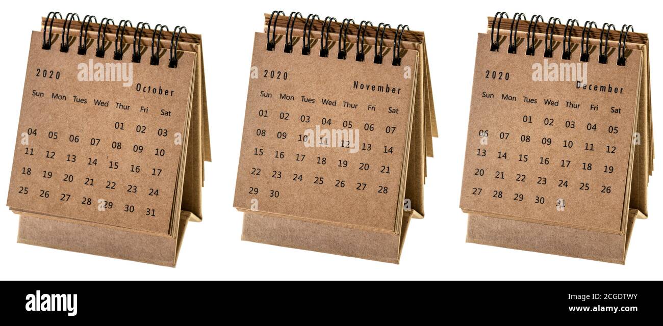 Ottobre, novembre e dicembre 2020 - calendario dei desktop a spirale isolato sul concetto aziendale bianco Foto Stock
