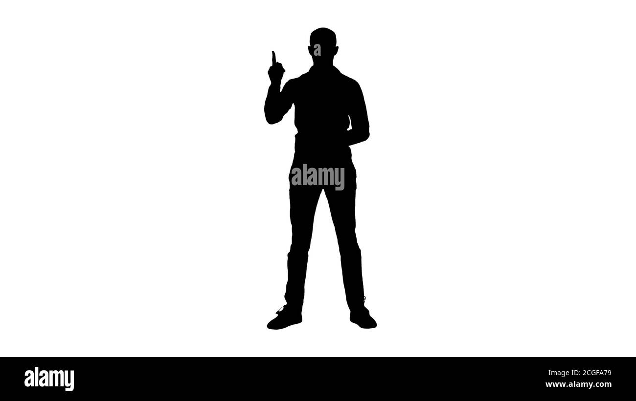 Silhouette uomo arabo in casual facendo attenzione gesto dito verso l'alto. Foto Stock