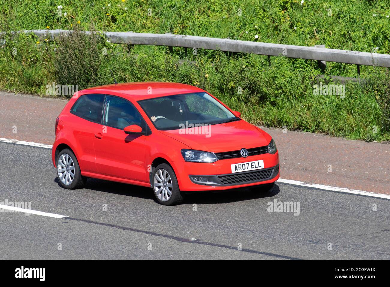 2012 Red VW Volkswagen Polo Match 85; veicoli in movimento per il traffico  veicolare, auto che guidano veicoli su strade del Regno Unito, motori,  automobili sulla rete autostradale M6 Foto stock - Alamy