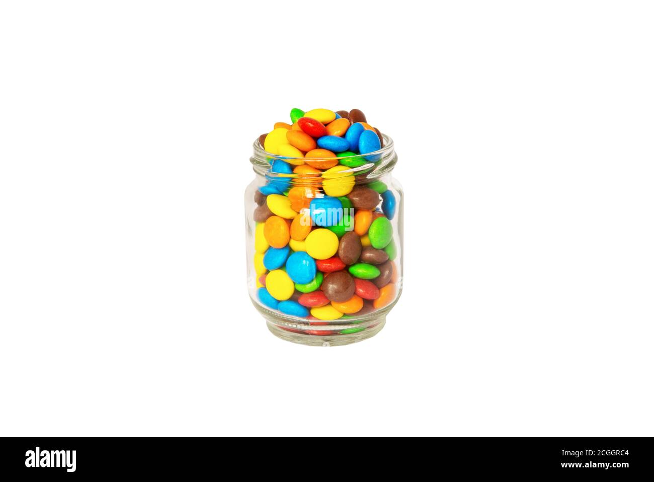 Caramelle multicolore in un vaso di vetro isolato su un bianco sfondo Foto Stock