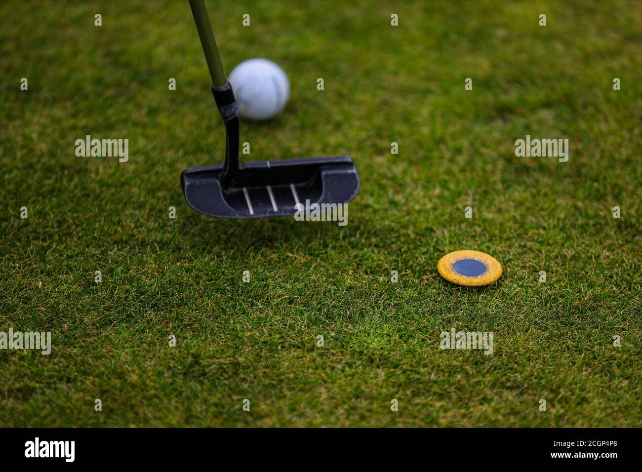 Il marcatore di golf segna la pallina spot Foto Stock