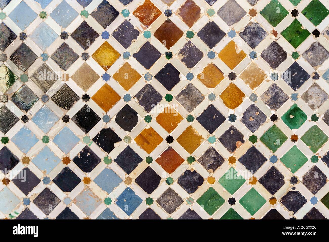 Pareti in ceramica nell'Alhambra di Granada. Foto Stock