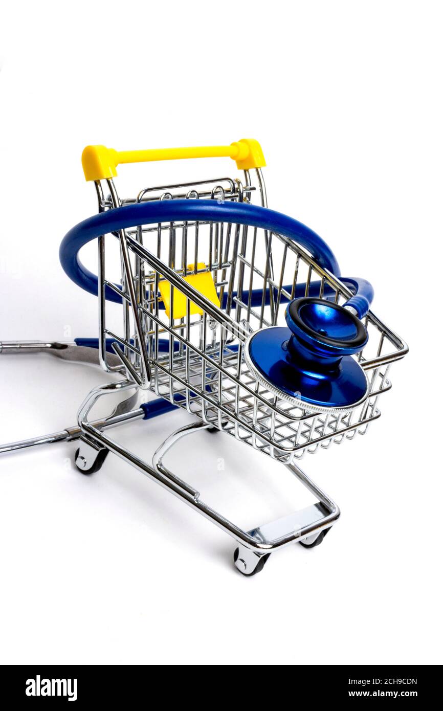 Carrello combinato con uno stetoscopio simboleggia la salute e il benessere nella vita di tutti i giorni Foto Stock