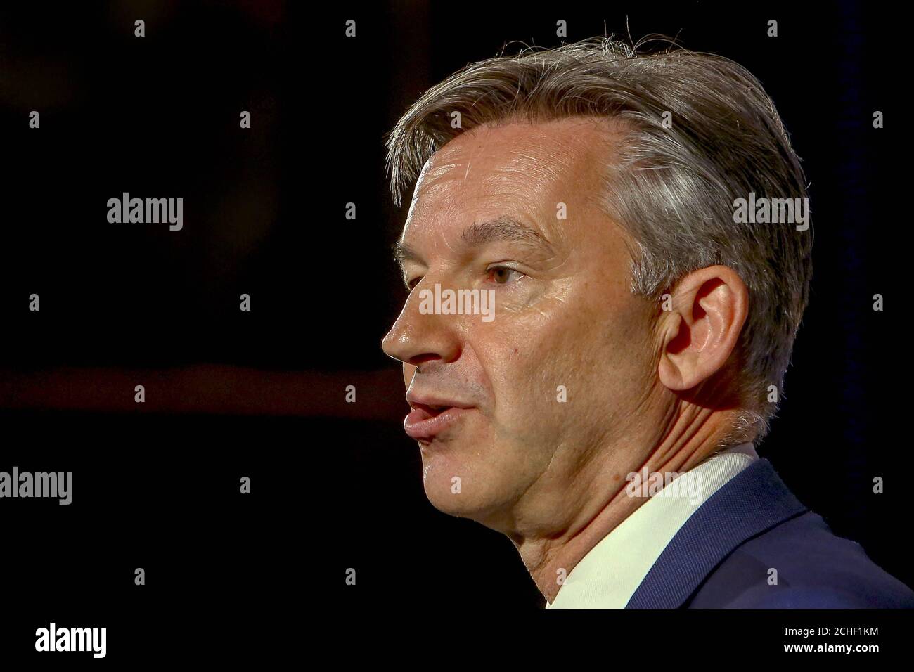 Mike Hawes, Chief Executive della Society of Motor Manufacturers and Traders (SMMT) durante una conferenza stampa al SMMT International Automotive Summit 2019, presso l'IET di Londra. Foto Stock