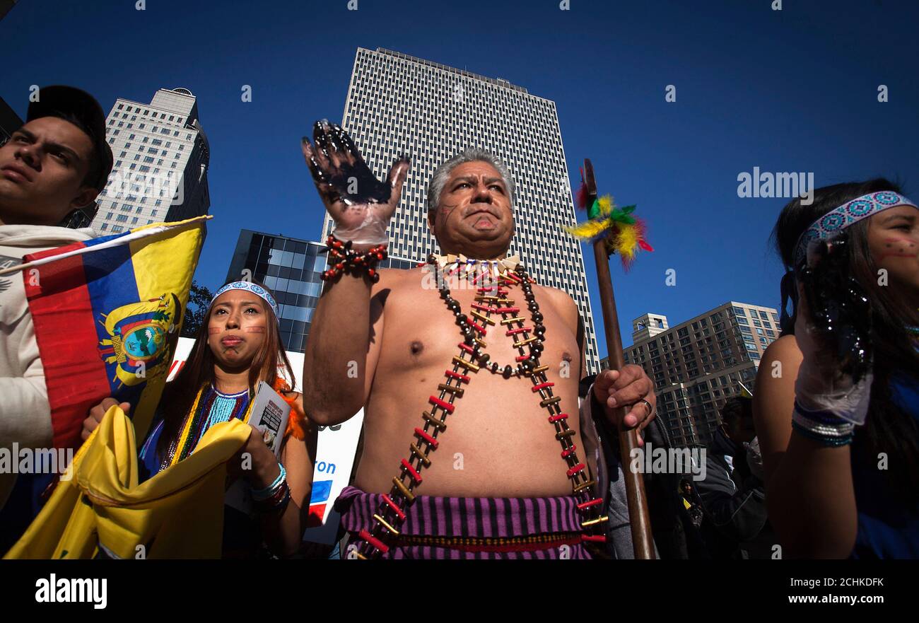 People from Ecuador protest against Chevron's Racketeer Influenced and  Corrupt Organizations (RICO) trial in New York, October 15, 2013. Chevron  Corp will try to convince a U.S. judge this week that a