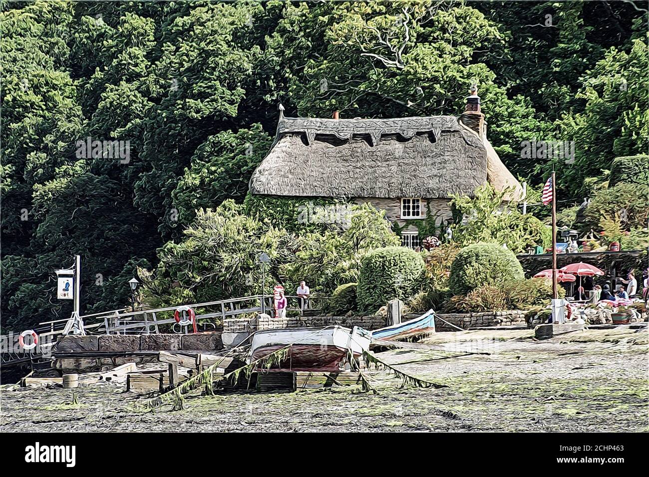 Foto illustration The attraente Taverne Cottage con tetto di paglia conosciuto anche come Smugglers Cottage sul fiume Fal in Cornovaglia 2006. Grado II elencato buildin Foto Stock
