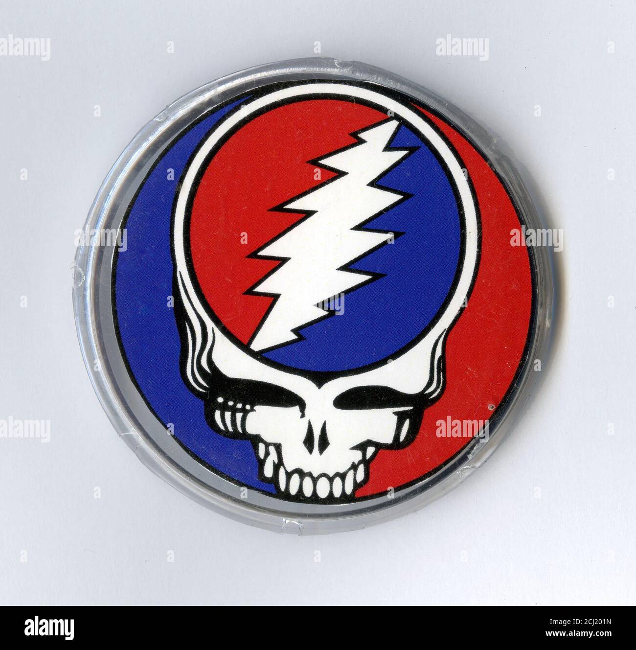 Bottone ricordo raffigurante il logo Grateful Dead, deadhead. Foto Stock