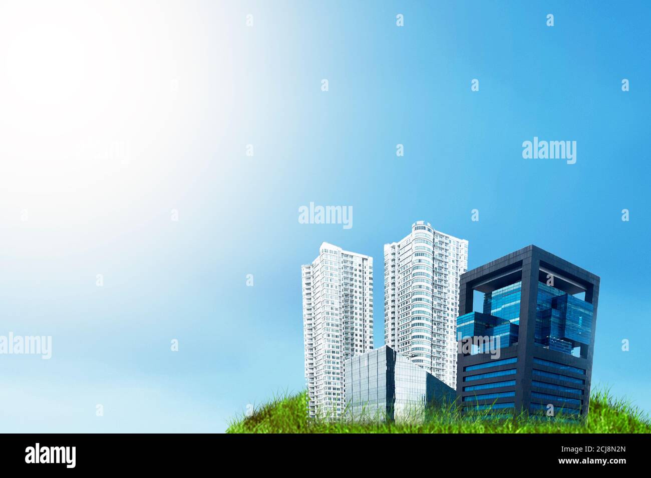Terreno con edifici e appartamenti con sfondo blu cielo. Giornata mondiale dell'habitat Foto Stock