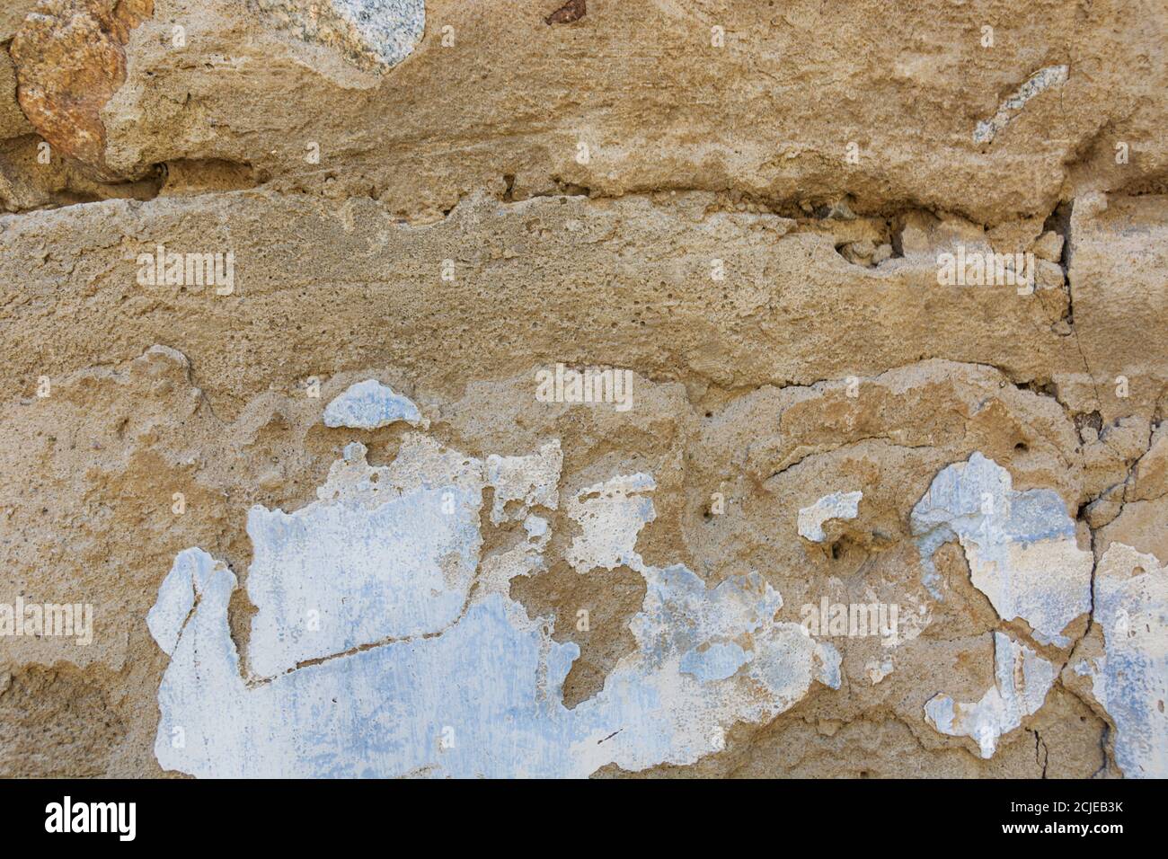 Parete in cemento giallo per superfici interne o esterne esposte lucidate. Foto Stock