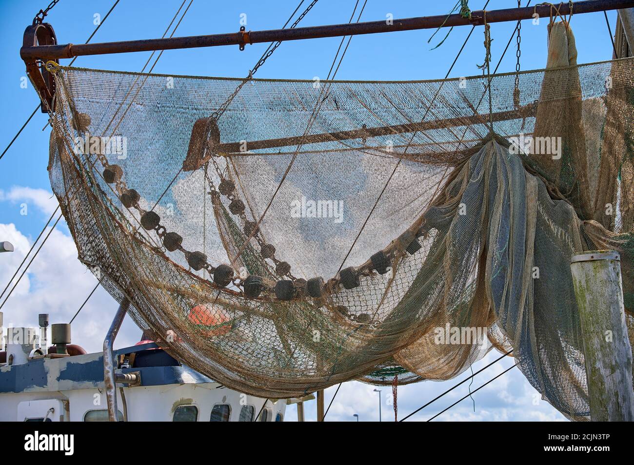 Barca di pesca del granchio ormeggiata nel porto Foto Stock