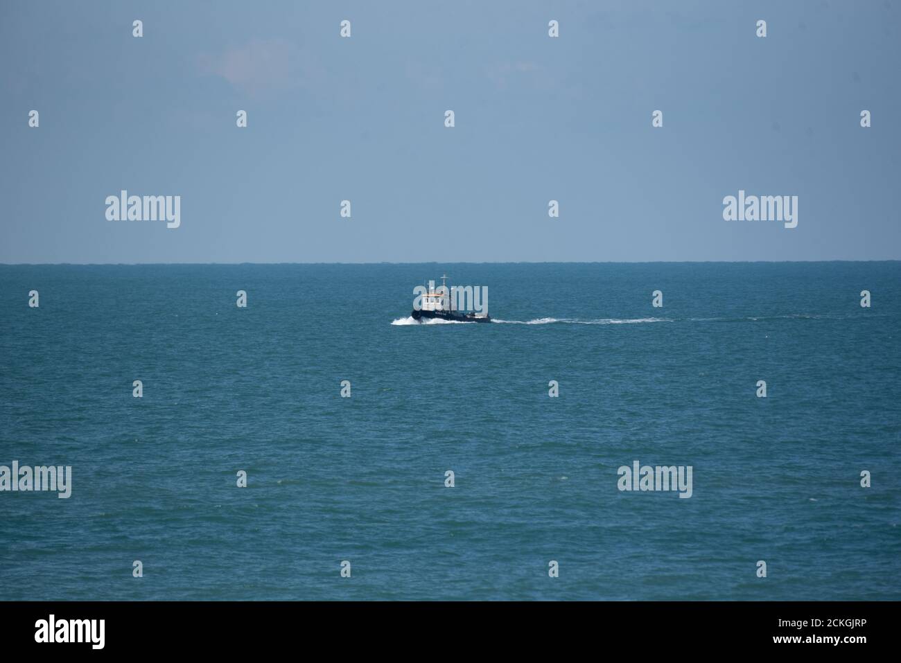 Vapore in tugboat avanti Foto Stock
