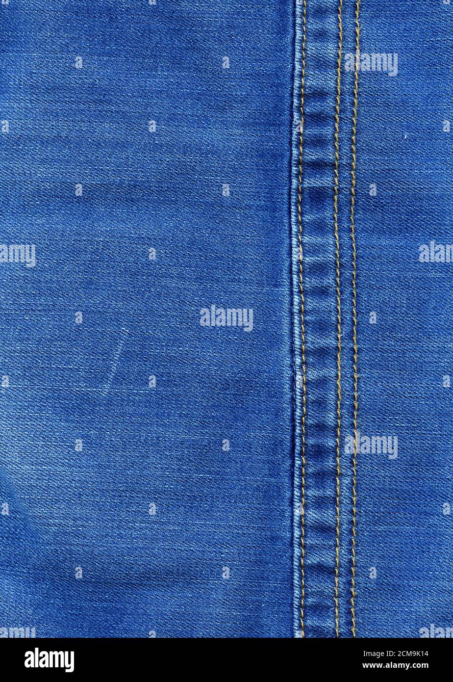 Cucito textured blue jeans tessuto denim sfondo Foto Stock