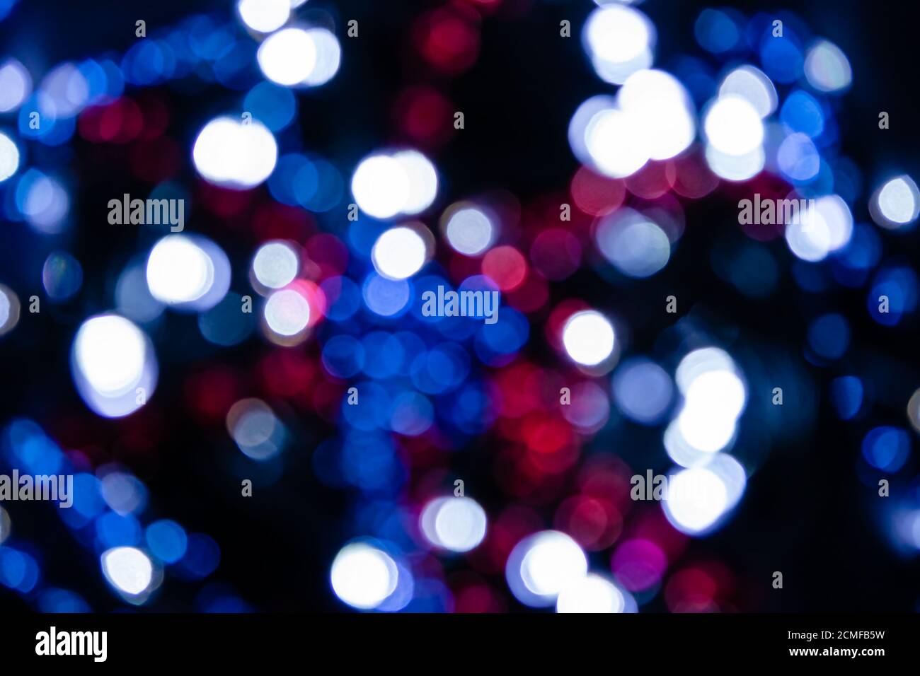 Bokeh astratto sfondo di luci sfocate. Sfondo festivo Foto Stock