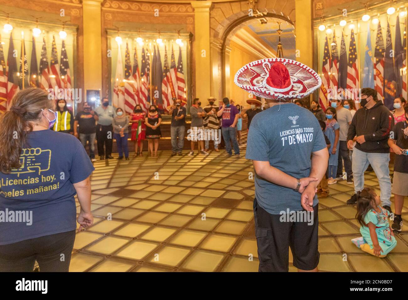 Lansing, Michigan - gli attivisti si radunano nell'edificio del Campidoglio del Michigan, chiedendo che la legislatura consenta agli immigrati non documentati di ottenere l'autista Foto Stock