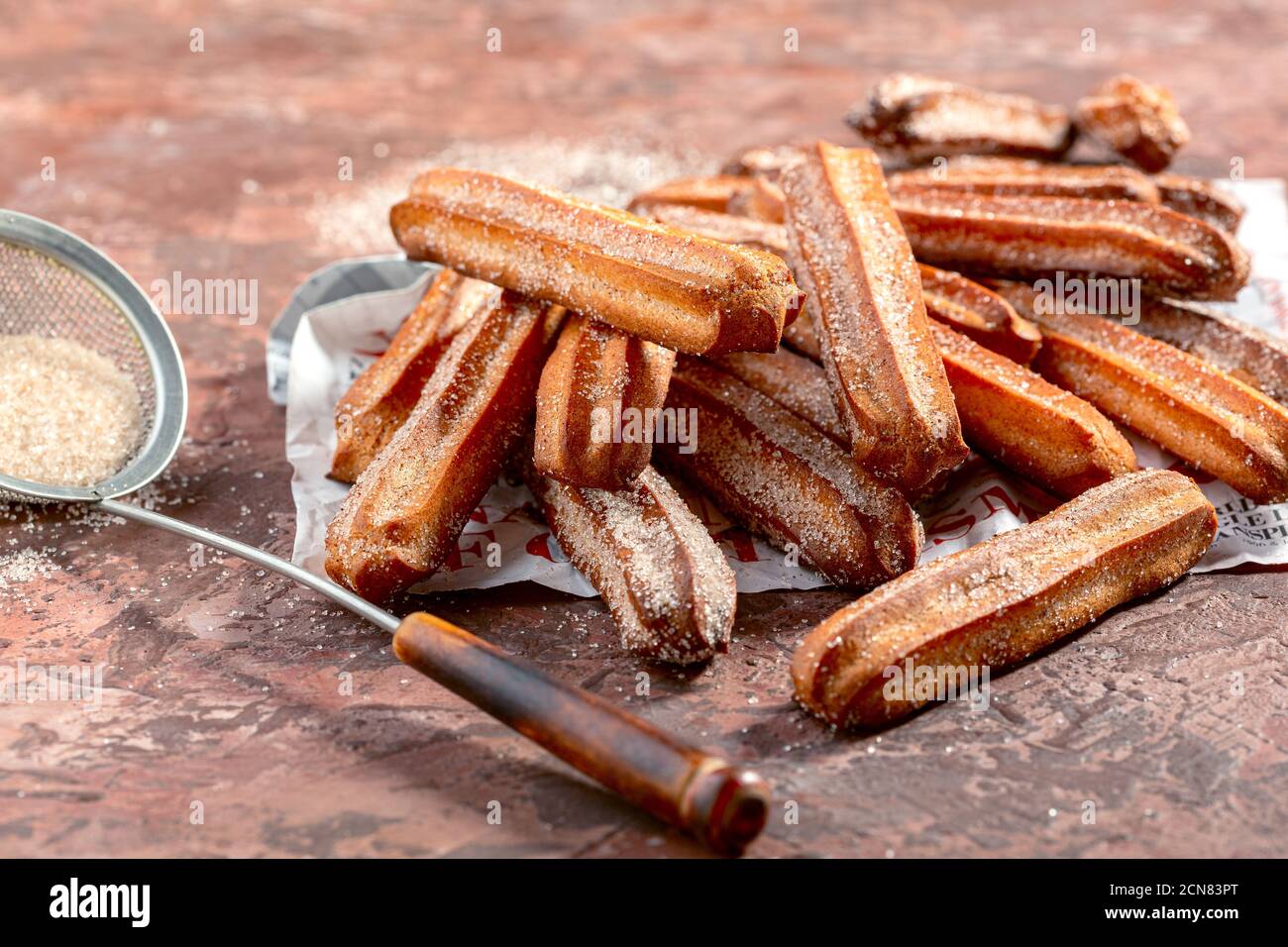 Churros - dessert spagnolo tradizionale. Foto Stock