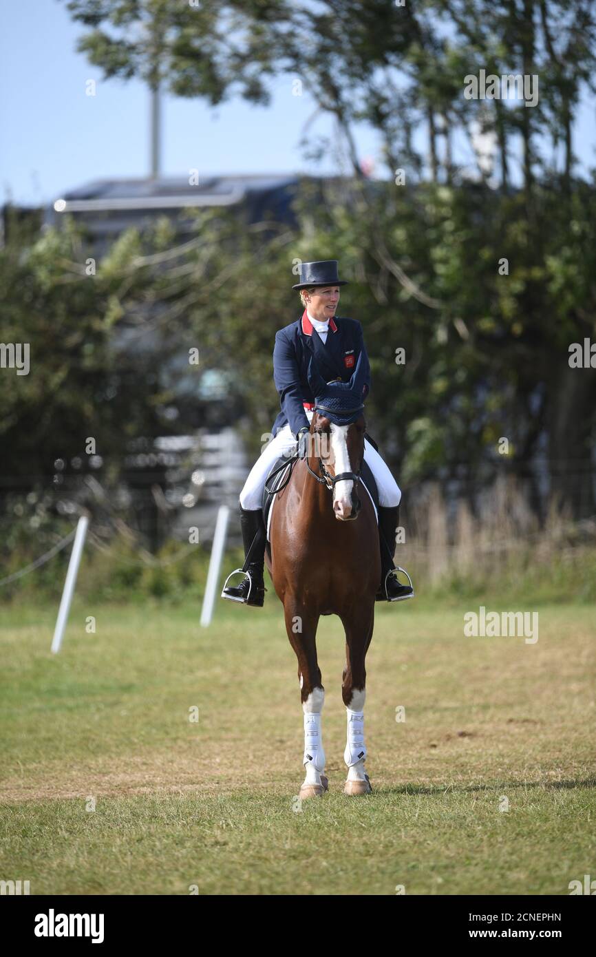 Zara Tindall in classe Affair, in competizione nella dressage durante il Burnham Market International Horse Trials a Norfolk. Foto Stock