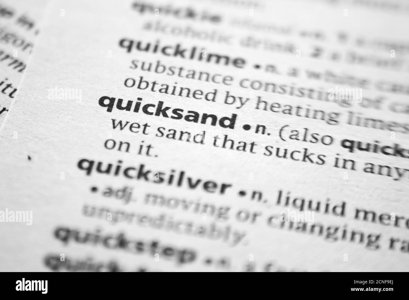 Parola o frase Quicksand in un dizionario Foto Stock