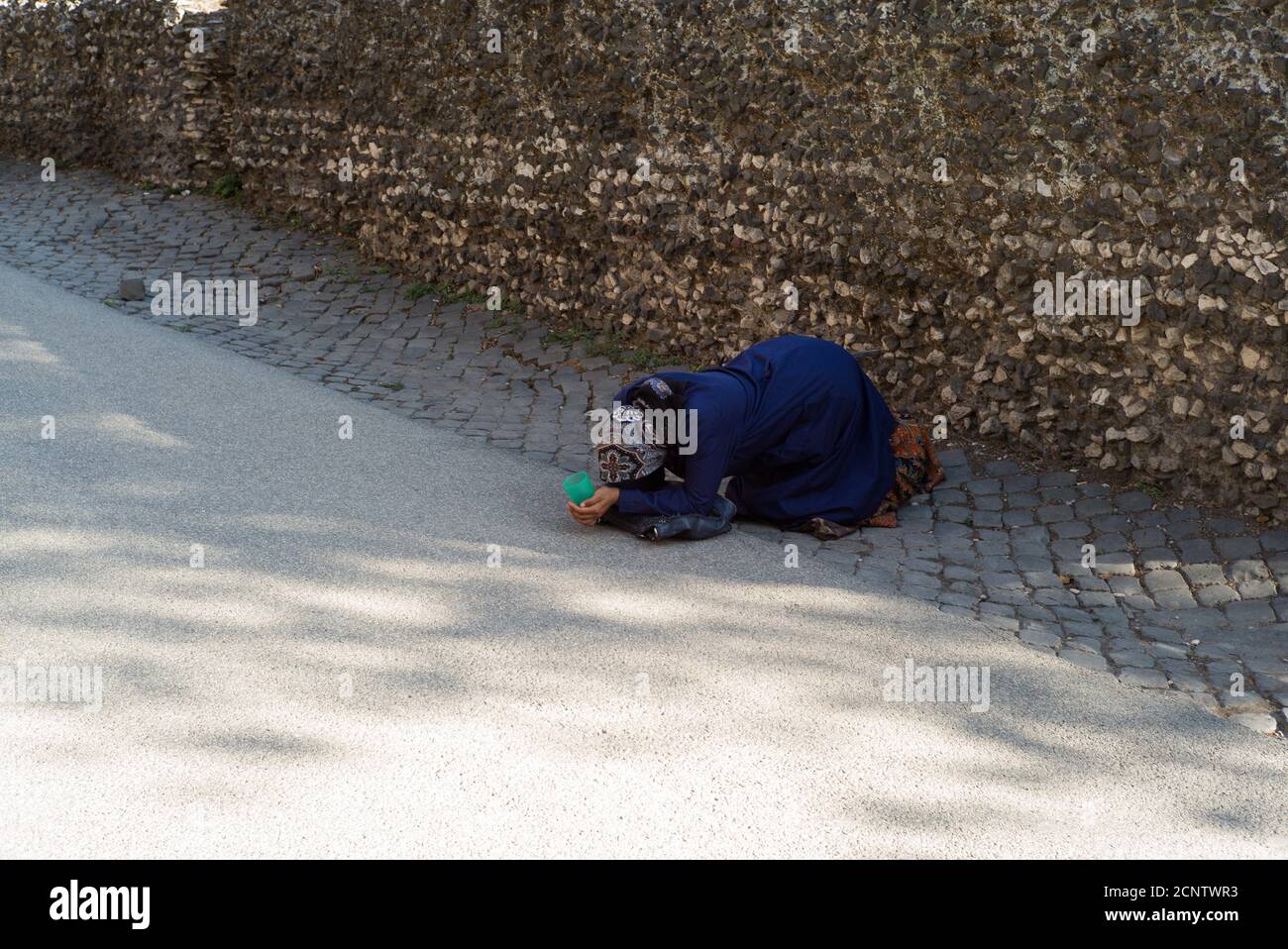 Donna Beggar, collina Palatina, Roma, Italia Foto Stock