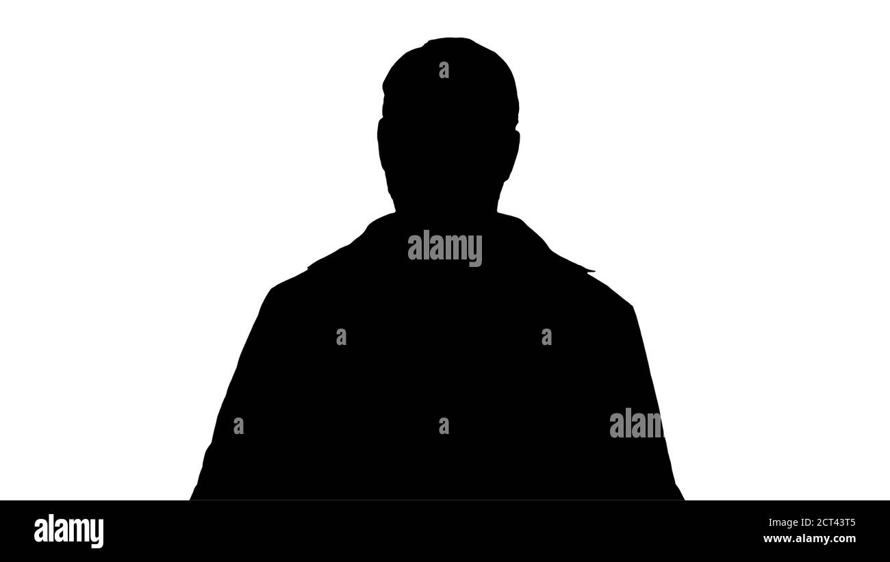 Silhouette concentrato medico che esamina testa cervello x raggio pictur Foto Stock