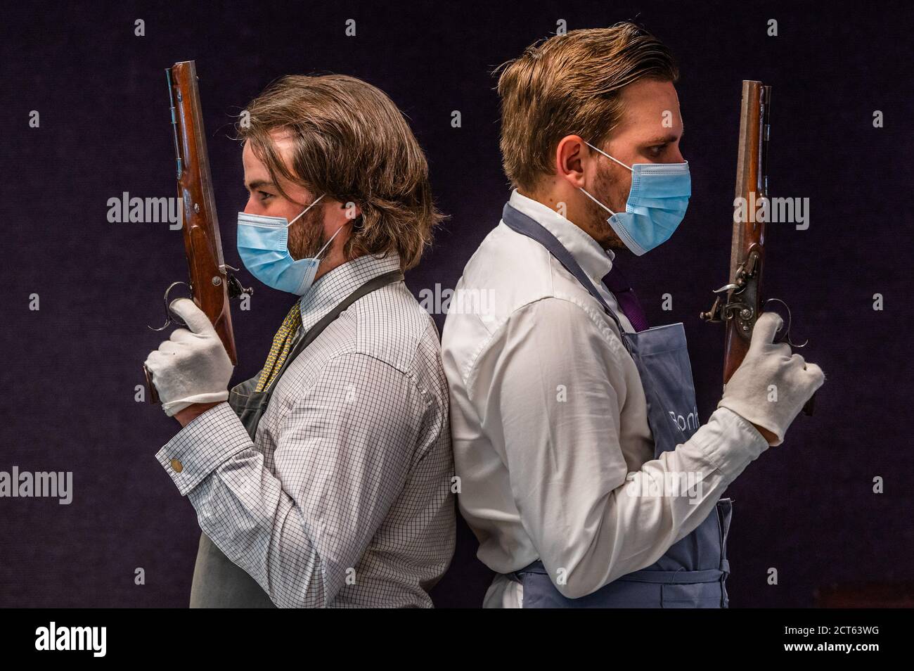 Londra, Regno Unito. 21 Settembre 2020. Un paio di pistole a 32 fori con manico a flintlock, da HW Mortimer & son, c1810, est £15-20,000 - Anteprima di Bonhams' Antique Arms e Armor vendita al loro Knightsbridge saleroom. La vendita si svolgerà mercoledì 23 settembre Credit: Guy Bell/Alamy Live News Foto Stock