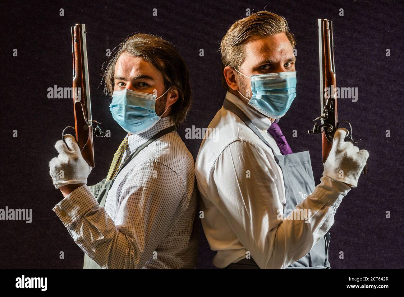 Londra, Regno Unito. 21 Settembre 2020. Un paio di pistole a 32 fori con manico a flintlock, da HW Mortimer & son, c1810, est £15-20,000 - Anteprima di Bonhams' Antique Arms e Armor vendita al loro Knightsbridge saleroom. La vendita si svolgerà mercoledì 23 settembre Credit: Guy Bell/Alamy Live News Foto Stock