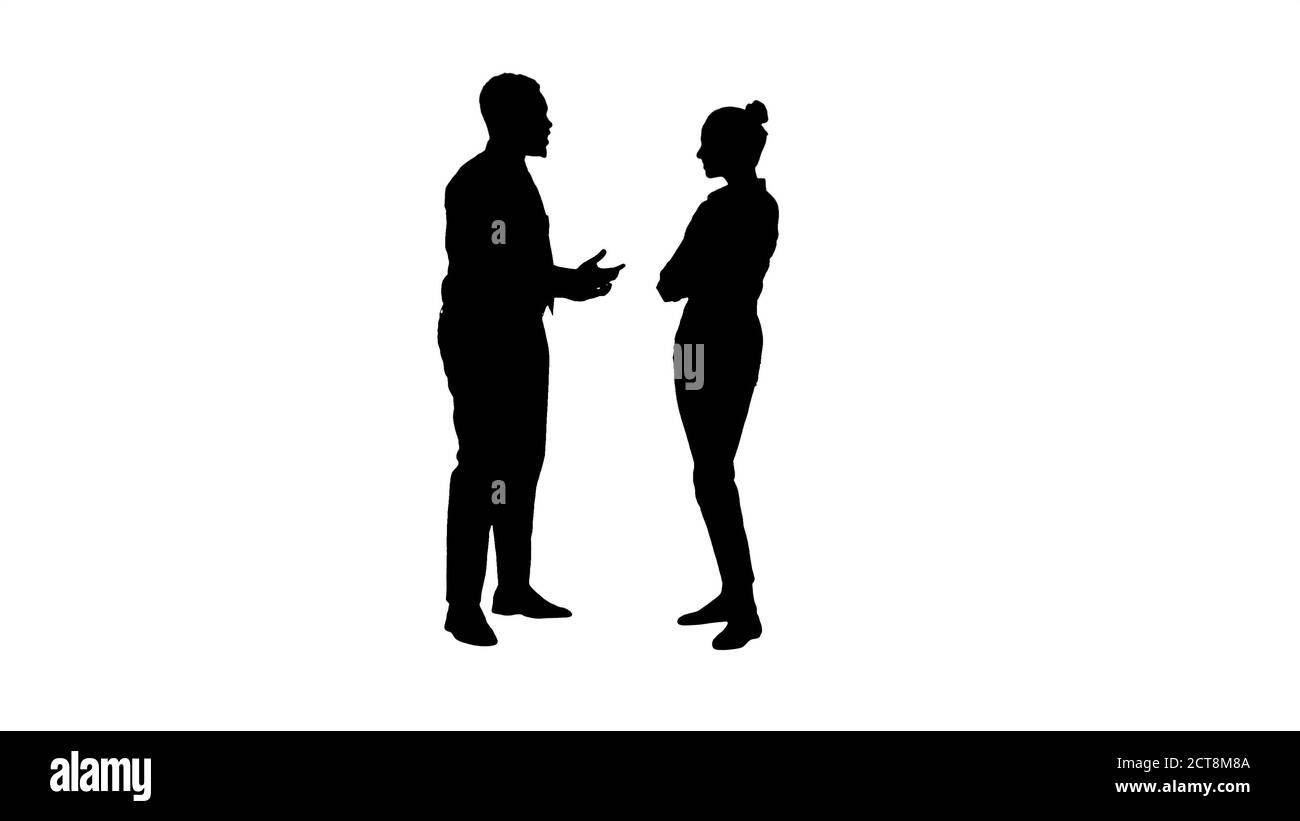 Silhouette uomo d'affari afro-americano spiegare qualcosa a. Foto Stock