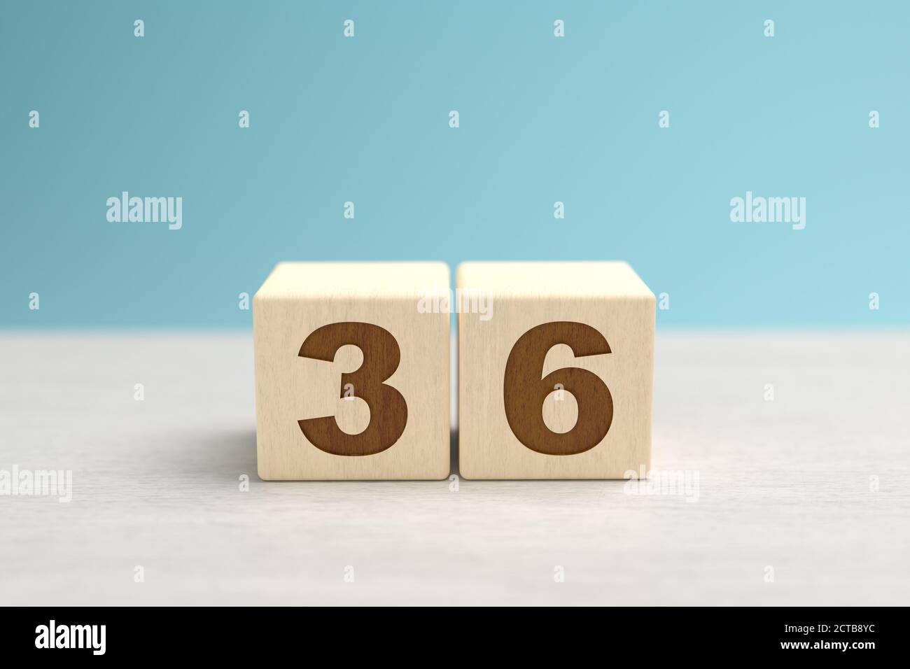 Blocchi di giocattoli di legno che formano il numero 36. Foto Stock