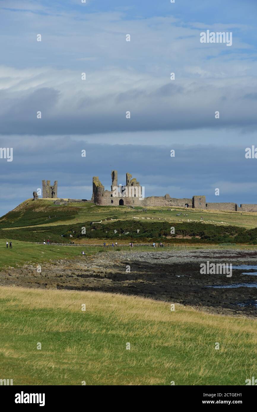 Castello di Dunstanburgh, Crister, Northumberland Foto Stock