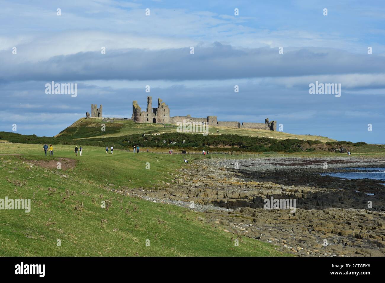 Castello di Dunstanburgh, Crister, Northumberland Foto Stock