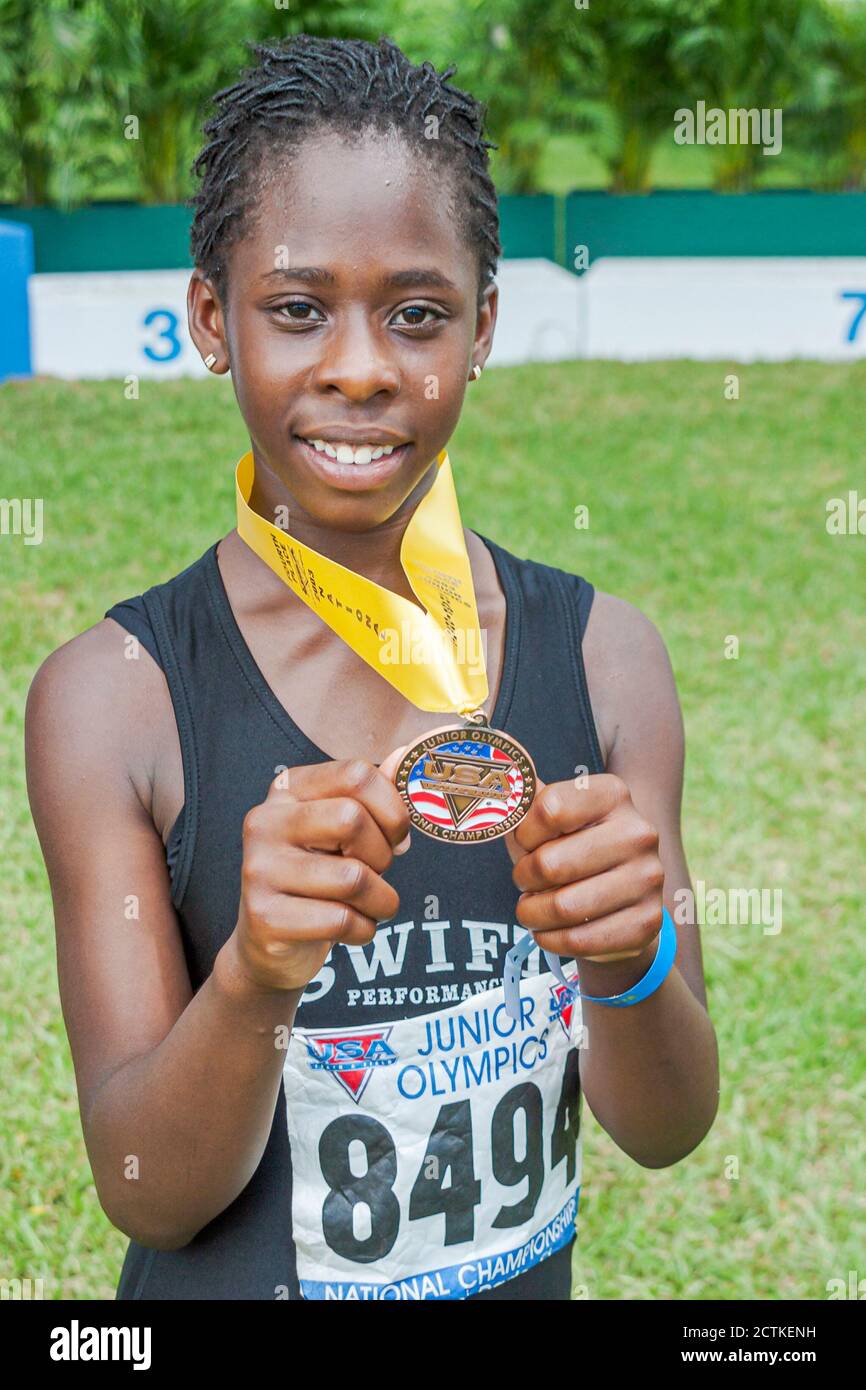 Miami Florida,Tropical Park,USA Track & Field National Junior Olympics,Student Students Competition sports,atleta Athletes Black African Africans tee Foto Stock